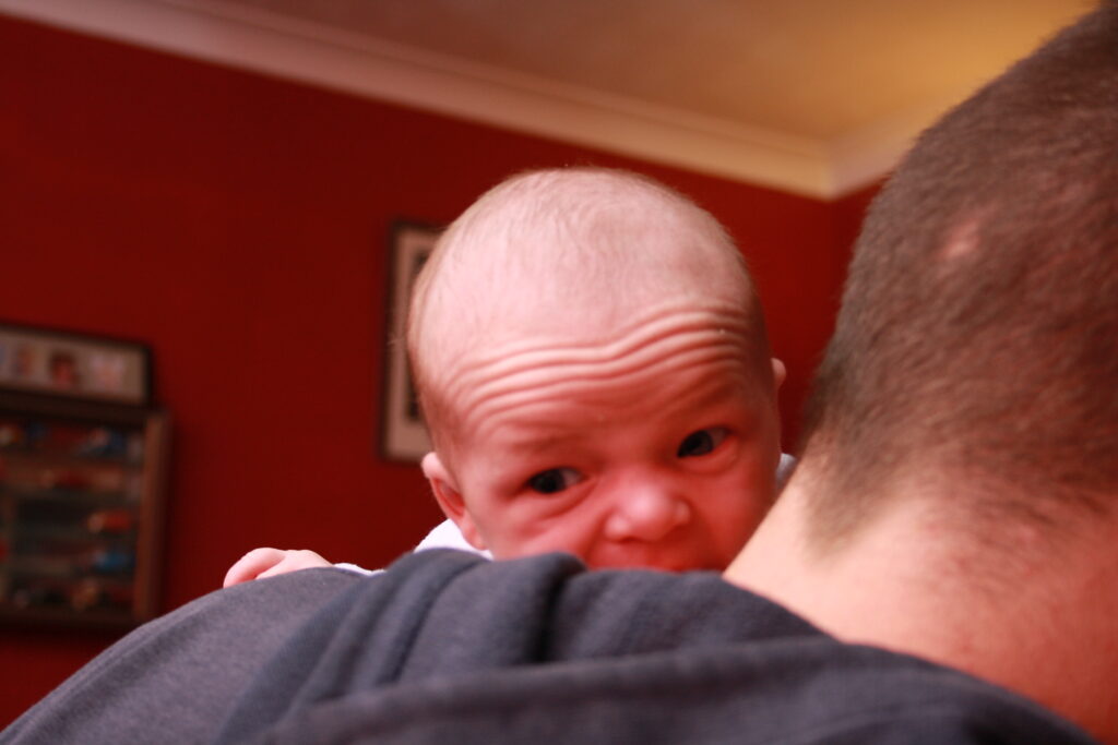 spinal injured dad holding the baby