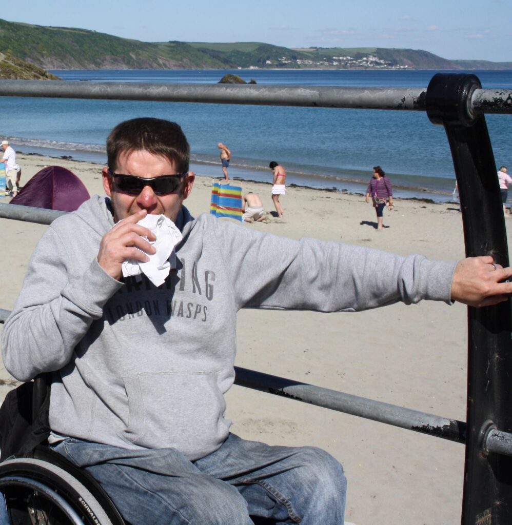 Sat eating a paste in Looe in my wheelchair